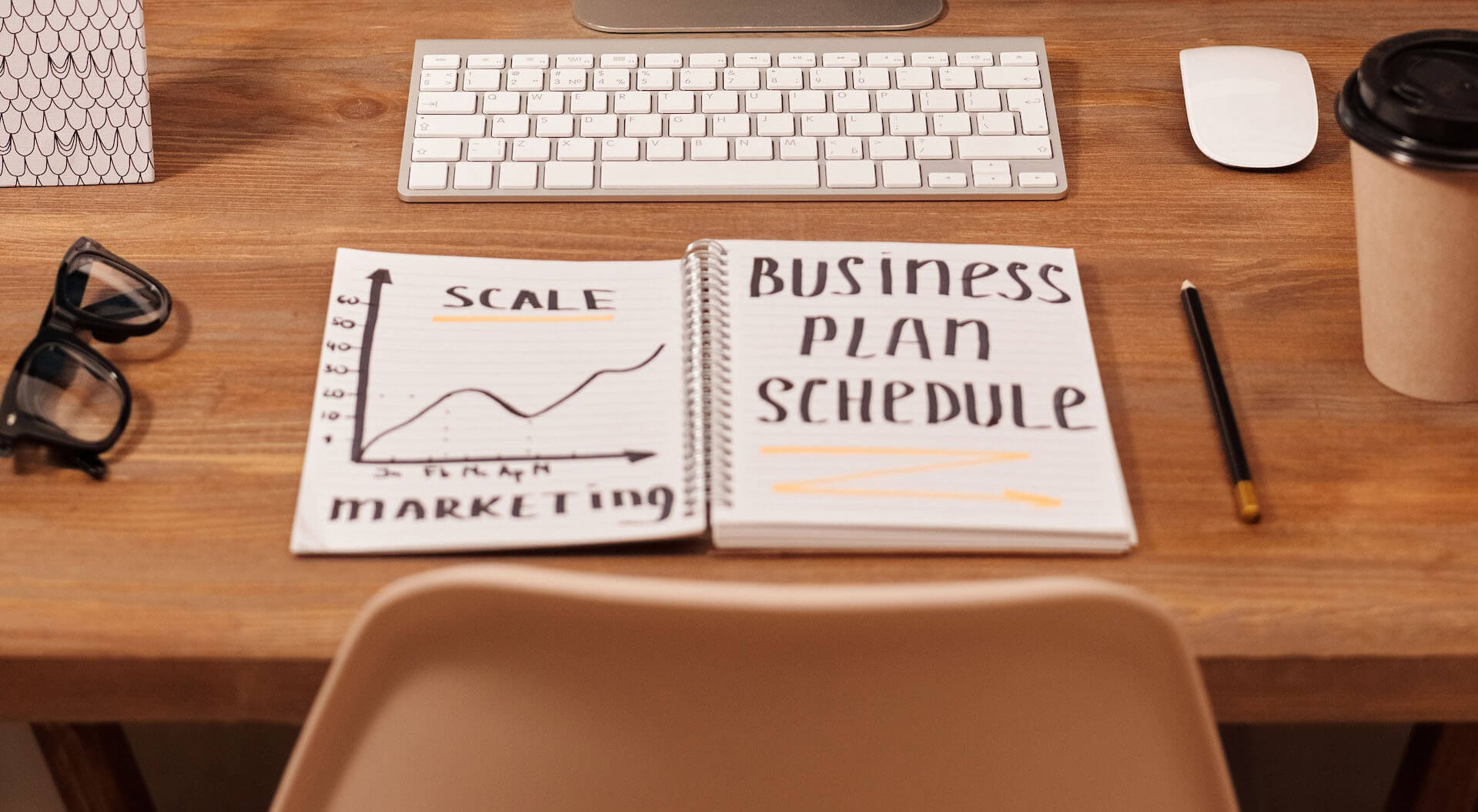 Business Plan Schedule Written on the Notebook